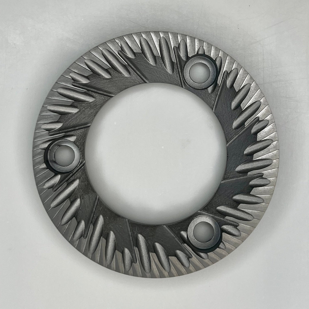 Coffee grinder burr set illustrating surfaces inspected for burr wear
