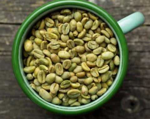 Nicaragua Pacamara Peaberry green coffee beans illustrating rounded peaberry seeds