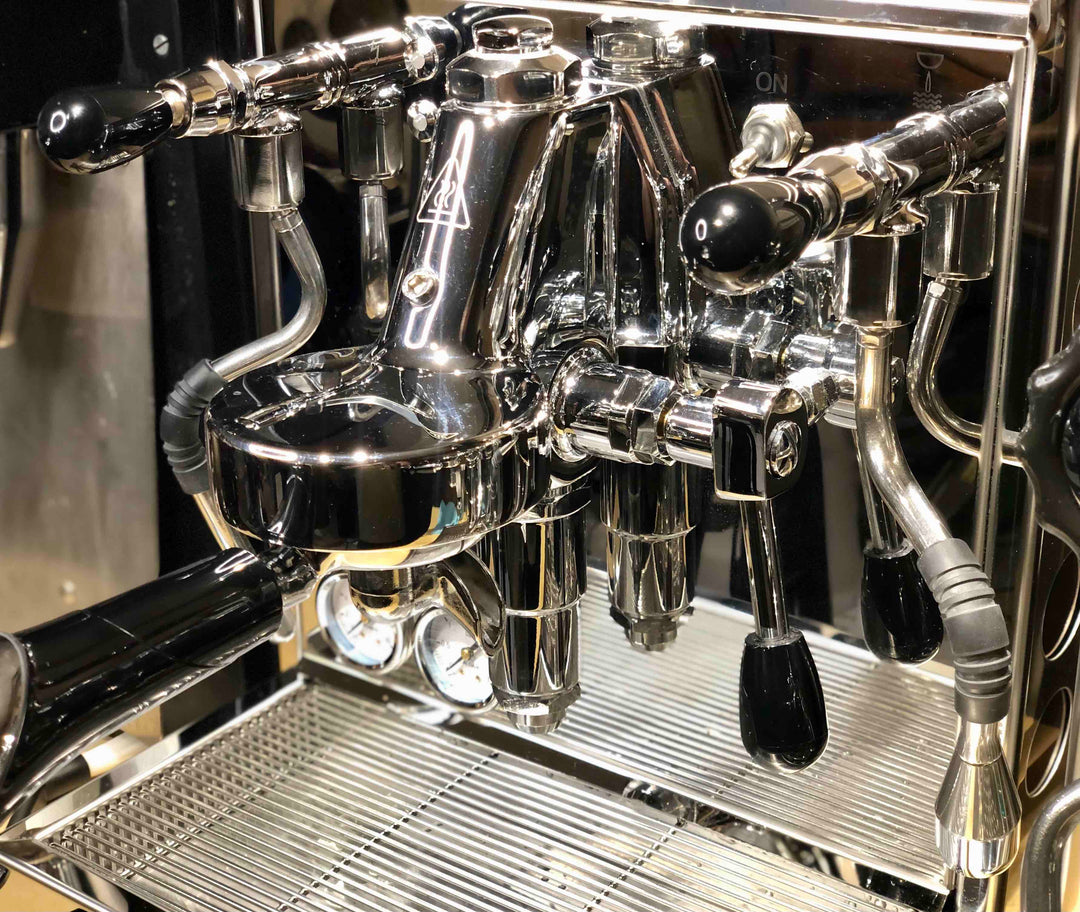 Chrome E61 grouphead and brew lever on a Bezzera Magica espresso machine