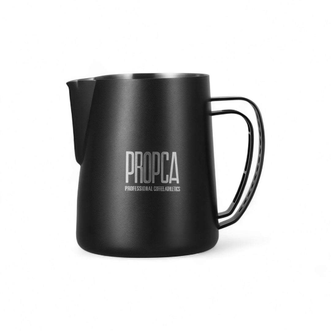 Professional latte art milk pitcher with shaped pouring spout