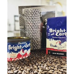 Bright and Early 1918 Medium Roast Coffee Blend — Bright and Early packages beside a textured container and scattered coffee beans