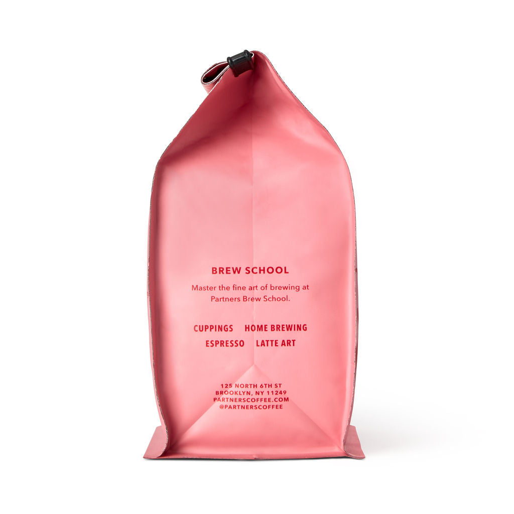 Bag of specialty roast coffee from Origin Unknown with notes of Rich Flavors