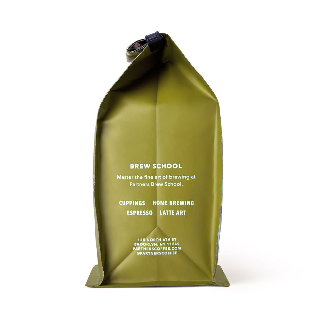 Bag of specialty roast coffee from Origin Unknown with notes of Chocolate