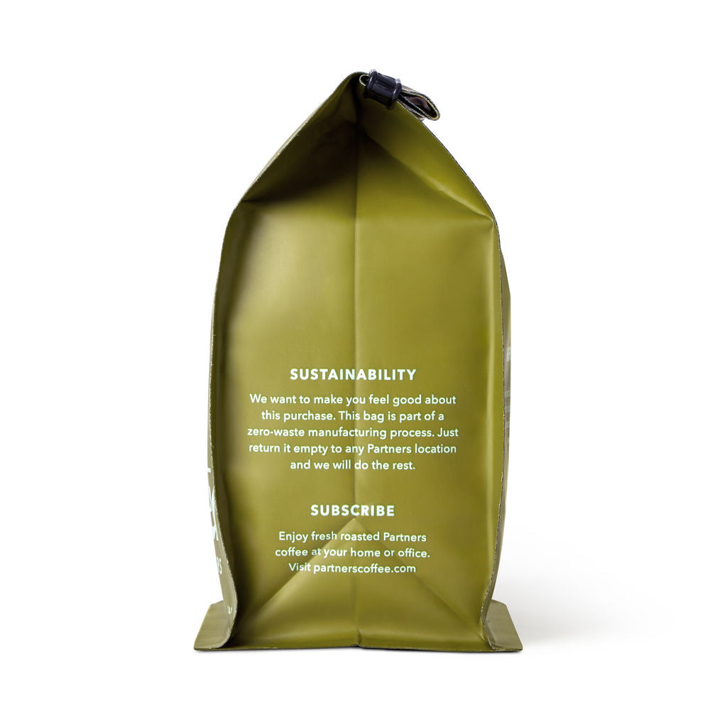 Bag of specialty roast coffee from Origin Unknown with notes of Chocolate