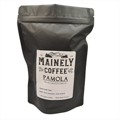 Black Mainely Pamola Brazilian water-process decaf pouch with a white label