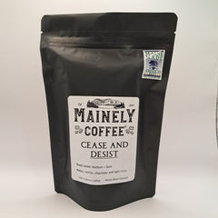 Black Mainely bag labeled Cease and Desist in the Northern Terminus product gallery