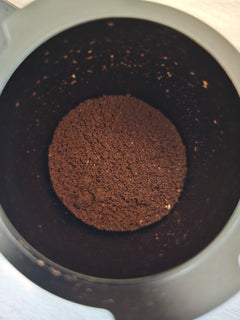 Rear and side view of white Turin CF64V grinder