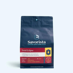 Savorista Total Eclipse decaf bag with burgundy label