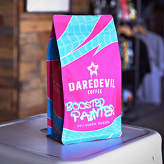 Front of pink-and-turquoise Boosted Painter package