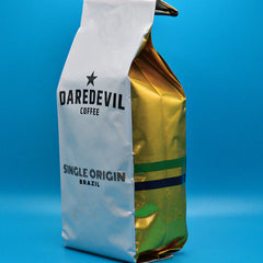 Angled Brazil bag with green-and-gold side panels