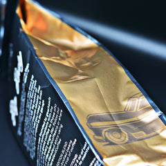 Folded gold side of Big Body package
