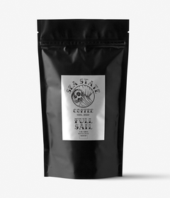 Close view of the Sea State Full Sail coffee pouch label