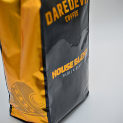 Three-quarter front view of House Blend bag