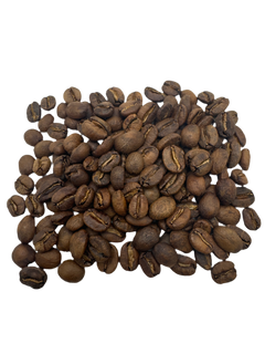 Roasted Cinnamon Roll coffee beans pictured against a dark background