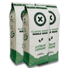 Three Black Insomnia Classic Roast whole-bean bags