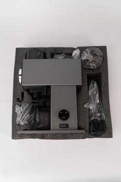 Grey CF64V aluminum dosing cup below the chute