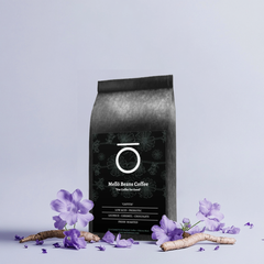 Caffita coffee bag arranged with purple chicory flowers and roots
