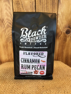Cinnamon Rum Pecan bag on burlap against wood