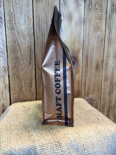 Side of Cinnamon Rum Pecan coffee bag marked Craft Coffee