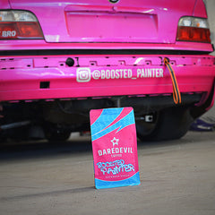 Boosted Painter coffee bag in front of pink drift car