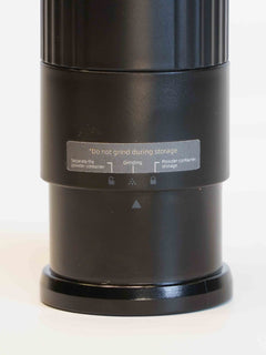 Turin TrekGrind collapsible dosing cup stored in grinder body
