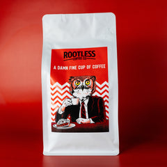 Rootless A Damn Fine Cup Light-Medium Roast Coffee — DamnFine RedBackground 1080x1080 (view 1)