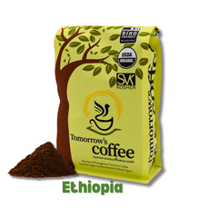 Tomorrow’s Coffee bag beside darker-colored ground coffee — Tomorrow’s Coffee Ethiopian Organic Coffee gallery