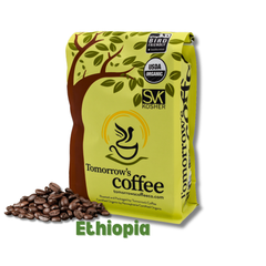 Tomorrow’s Coffee bag beside darker-roasted whole beans — Tomorrow’s Coffee Ethiopian Organic Coffee gallery