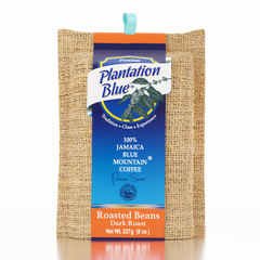 Plantation Blue 8 oz dark whole-bean Jamaica Blue Mountain coffee in burlap packaging with a tall blue label