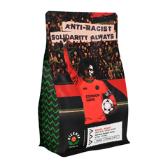 Angled view showing the Solidarity Always bag’s patterned side — Kickoff Solidarity Always Rwanda Coffee