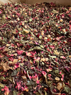 Bombshell Breeze fruit and flower tea spread in a tray