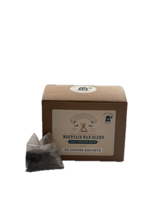 Mountain Man coffee sachet box with an individual sachet beside it — Mountain Man Light-Medium Coffee Blend gallery