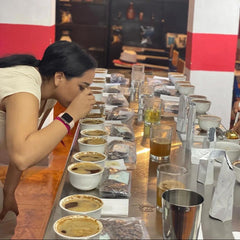 Coffee producer Lilly cupping roasted coffee