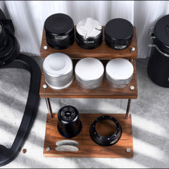 Three-tier walnut coffee utensil organizer detail