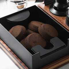 Multi-function coffee tamping station detail