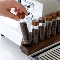 Lab-style coffee bean storage rack detail