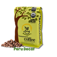 Tomorrow’s Coffee bag beside lighter-roasted whole beans — Tomorrow’s Coffee Peru Decaf Coffee gallery