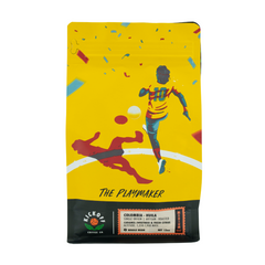 Front-facing Playmaker bag with yellow soccer artwork — Kickoff The Playmaker Colombia Medium Roast Coffee