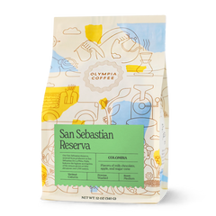 Olympia San Sebastián Reserva Colombian Coffee — illustrated Olympia bag with green San Sebastian Reserva label