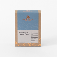 Front-facing Pink Elephant Swiss Water Decaf package and origin label