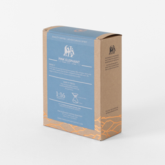 Angled rear view of the Pink Elephant Swiss Water Decaf package