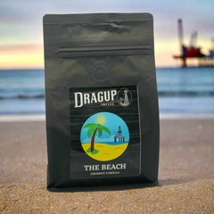 Drag Up The Beach Coconut Vanilla Coffee — Bag of medium roast coffee from Origin Unknown with notes of Rich Flavors — image 1