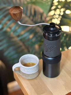 Turin H63 hand grinder with dark gray aluminum body