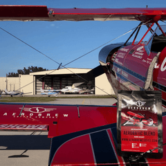 Aerobatic coffee bag beside a red aerobatic aircraft