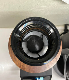 Coffee grinder anti-popcorn insert