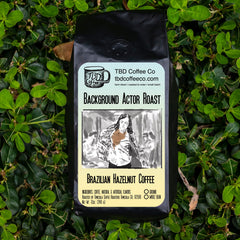 Background Actor hazelnut coffee package profile