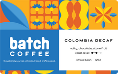 Colombia Decaf label listing nutty, chocolate and stone fruit notes