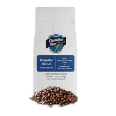 Plantation Blue Bespoke whole-bean pouch with blue labels and a pile of roasted beans