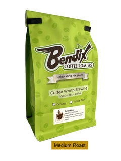 Front of green Bendix Dolce Medium Roast Coffee Blend bag showing its product label