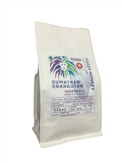 Fuzzy Monkey Sumatran Orangutan Dark Roast Coffee — Sumatran Orangutan pouch with the colorful Fuzzy Monkey mark